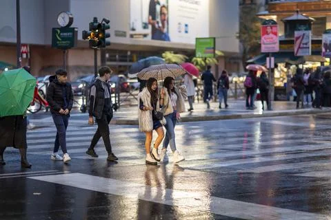 People in the rain Stock Photos