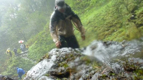 People in Rain Storm Stock Footage 874682