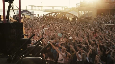 People raise hands up, clap with dj. Slow motion Stock Footage 54134540
