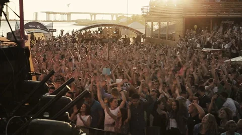 People raise hands up, clap with dj. Slow motion Stock Footage 54134564
