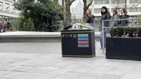 People React to Smoking Public Bin in Leicester Square London Video stock 331822512
