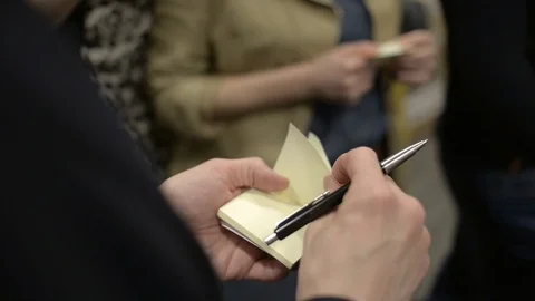 People Recording Notes On A Pad on a Conference in Office Stock Footage 88537983