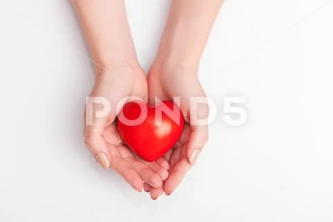 People, relationship and love concept - close up of womans cupped hands showi Stock Photos