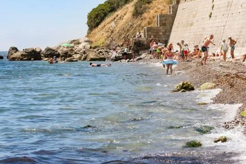 People relax on the beach. Stockfoto's