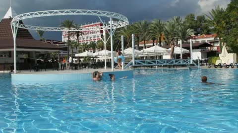 People relax by the pool Stock Footage 10875213