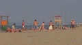 People relaxing and playing volleyball on the beach, Rimini, Italy, Europe HD Footage