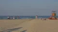 People relaxing and walking on the beach, Rimini, Italy, HD Footage