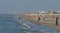 People relaxing and walking on the beach, Rimini, Italy, HD Footage