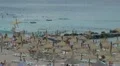 People relaxing on the beach HD Footage