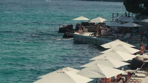 People Relaxing on Seaside Sun Deck in Opatija 스톡 동영상 339408130
