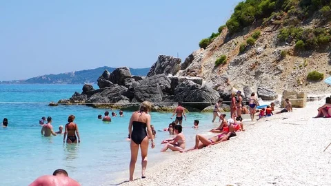 People relaxing at the sulphur beach near Xigia in Zakynthos, Greece Stock Footage