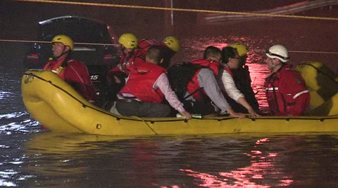 People rescued from stranded commuter train in Toronto flood after thunder storm Stock Footage 44385342