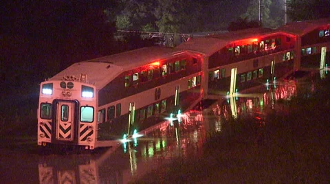 People rescued from stranded commuter train in Toronto flood after thunder storm Stock Footage 44385375