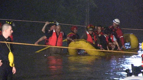People rescued from stranded commuter train in Toronto flood after thunder storm Stock Footage 62729554