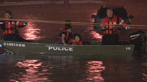 People rescued from stranded commuter train in Toronto flood after thunder storm Stock Footage 62730665