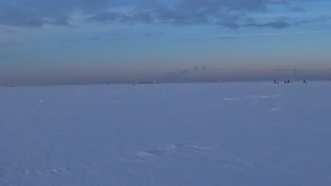 People rest on the ice on a cold winter day Video stock 168156384