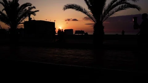 People rest on the lake on the sunset 스톡 동영상 80367131