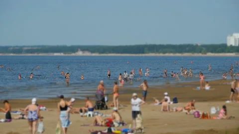 People resting on the beach Stock Footage 99907207