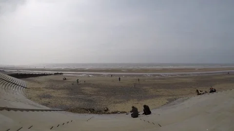 People resting on Cleveleys seafront Stock Footage 77863680