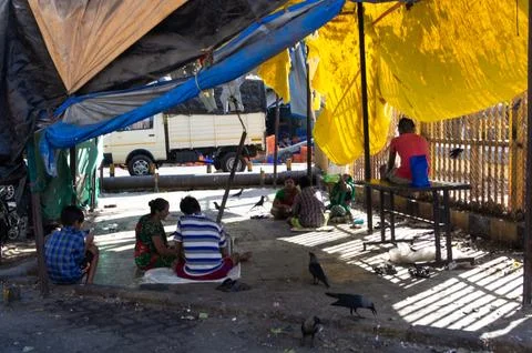 People resting in the shadow Stock Photos
