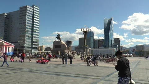 People resting on Suhebator Square, Ulaanbaatar. Mongolia. Timelapse. Stock Footage 302759226
