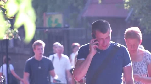 People return to work through the park Stock Footage 53299920