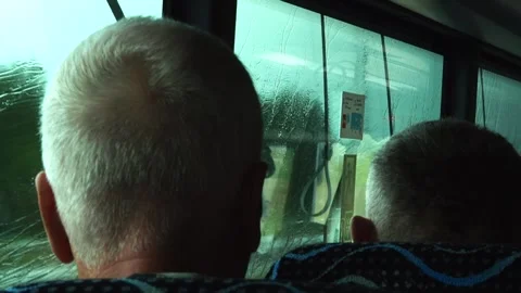 People ride the bus in the rain Stock Footage 246565716