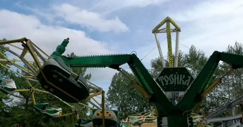 People ride the carousel "Troika" Stock Footage 67945548
