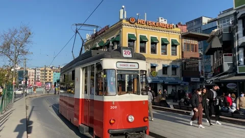 People ride in a electric Tram through the city of Istanbul, Turkey 4K Stock Footage 166407903