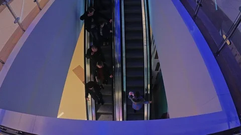 People ride the escalator Stock Footage 100642050