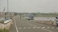 People riding bikes on the street in Sri Lanka HD Footage