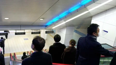 People Riding Escalator Video stock 84475150
