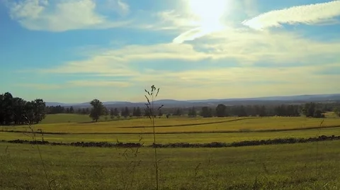 People Riding Horses Across Field Stock Footage 59553973