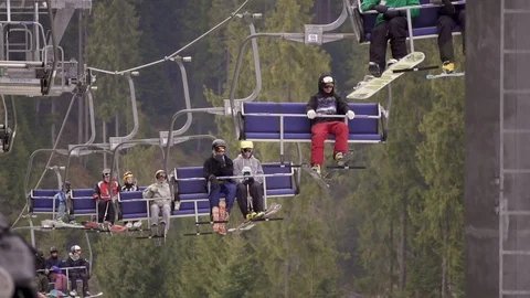 People riding on the lift Stock Footage 99178161