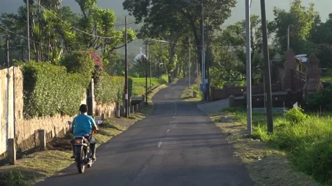 People riding on a road Stock Footage 235604483