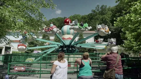 People riding the roller coaster 4k Video stock 76576356