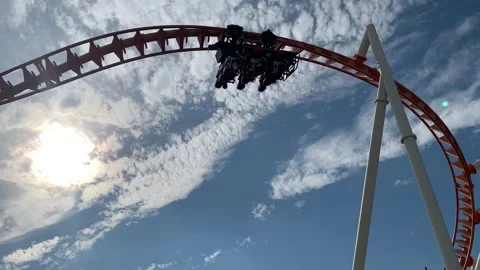 PEOPLE RIDING THUNDERBOLT ROLLERCOASTER AT CONEY ISLAND Stock Footage 335305268