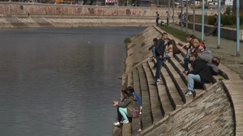 People by the river Stockbeeldmateriaal 37427222