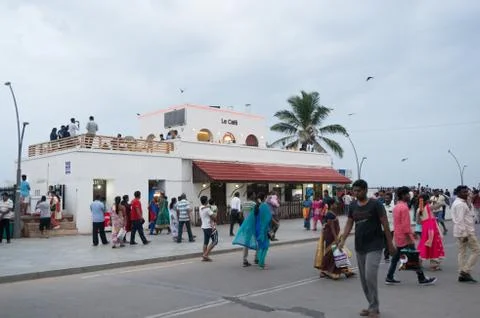 People roaming in front of cafe in pondicherry Stock Photos