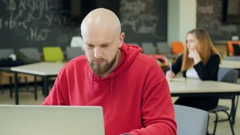 People at the robotics lessons, writting important things and trying to do the Stock Footage 156338479