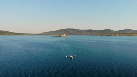 People rowing in the sea Stock Footage
