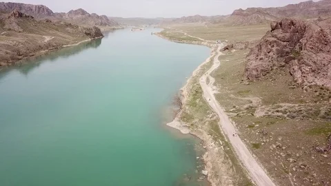 People run along the river. Jogging on the coast. Stock Footage 100772203