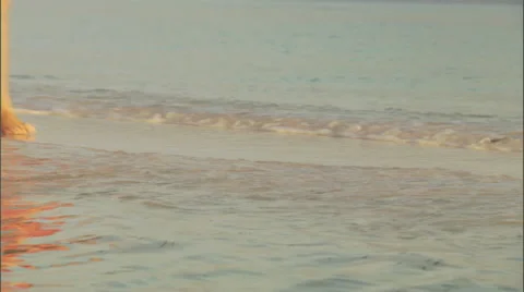People run on the shore on a beach. Stock Footage 46869717