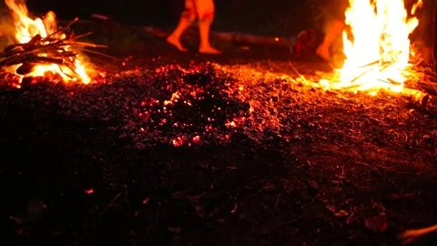 People running barefoot on fire Stock Footage 69904768