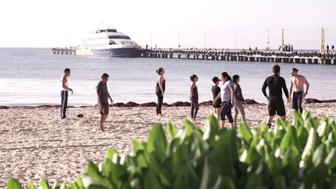 People running on the beach 2 Stock Footage 128088853
