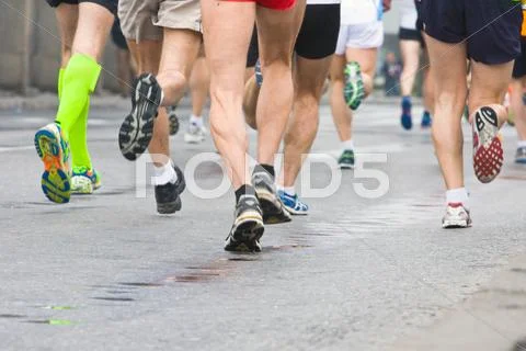 People running in city marathon Stock Photos