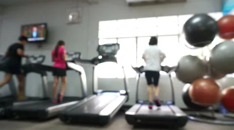 People running on machines blurred Stock Footage 61851984