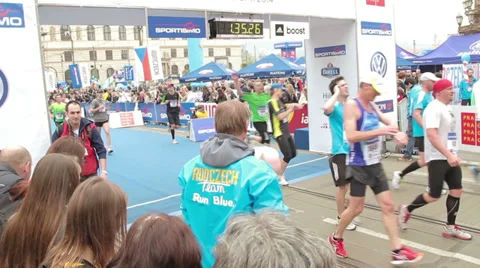 People running through finish line at half Marathon event Stock Footage 36990033
