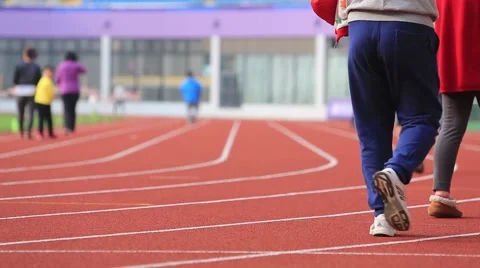 People running on the track Stock Footage 49938647