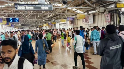 People Rush to Board Local Train at Thane station Mumbai city. 4K (Real Time). Stock Footage 249667172